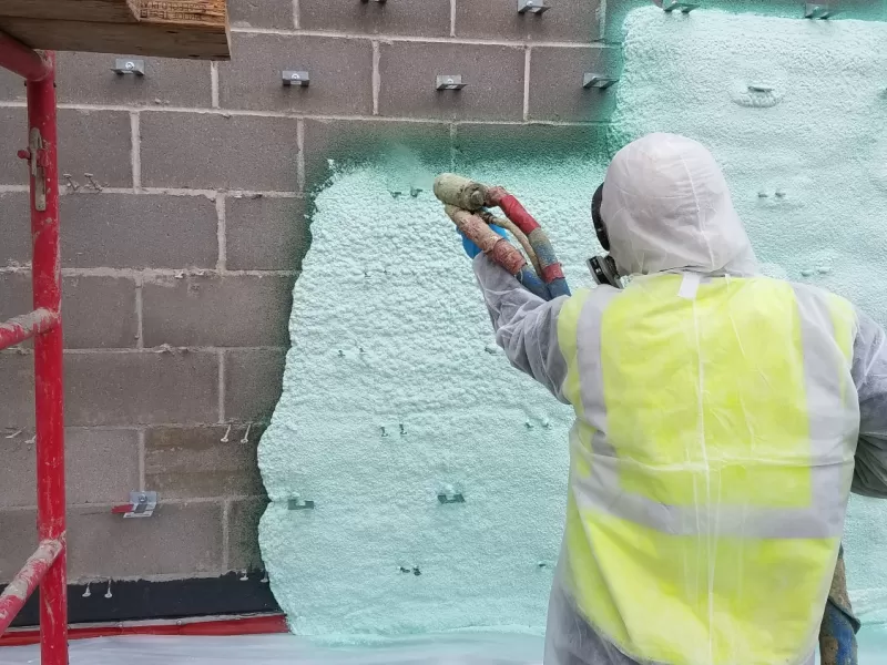 commercial spray foam insulation being applied commercial spray foam insulation being applied