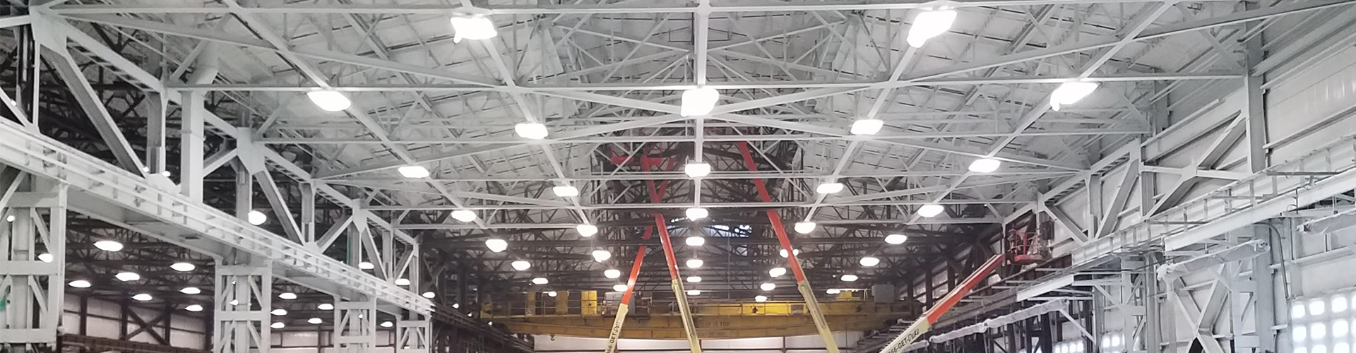 spray foam fireproofing insulation being installed on commercial building