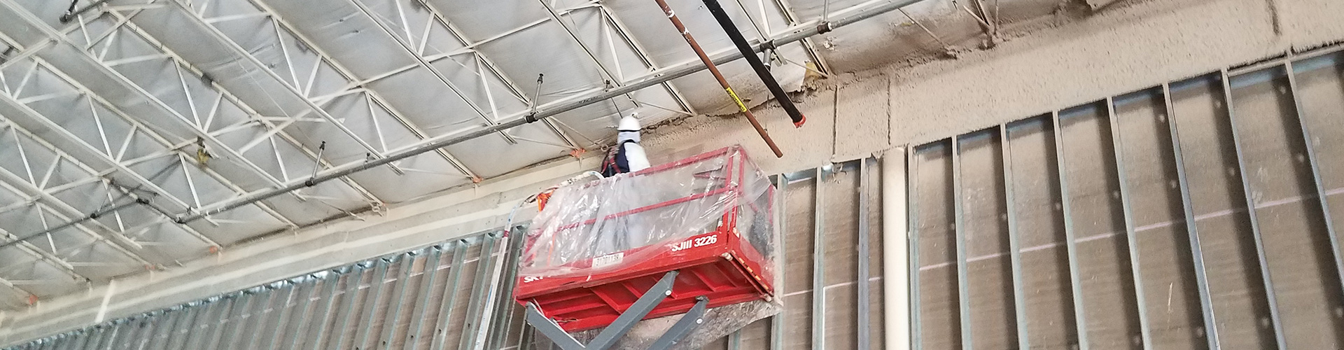 commercial spray foam insulation being installed