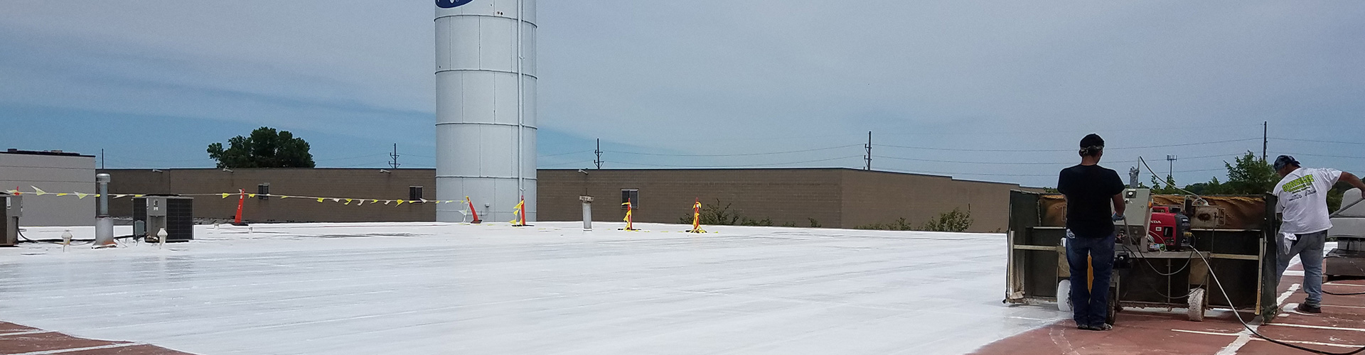 insulation and roof coating applied to industrial rooftop