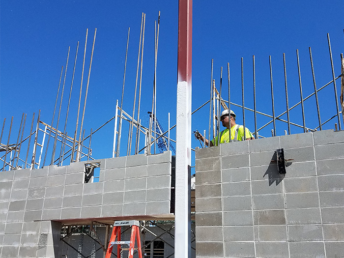 intumescent fireproofing coating being applied by contractor