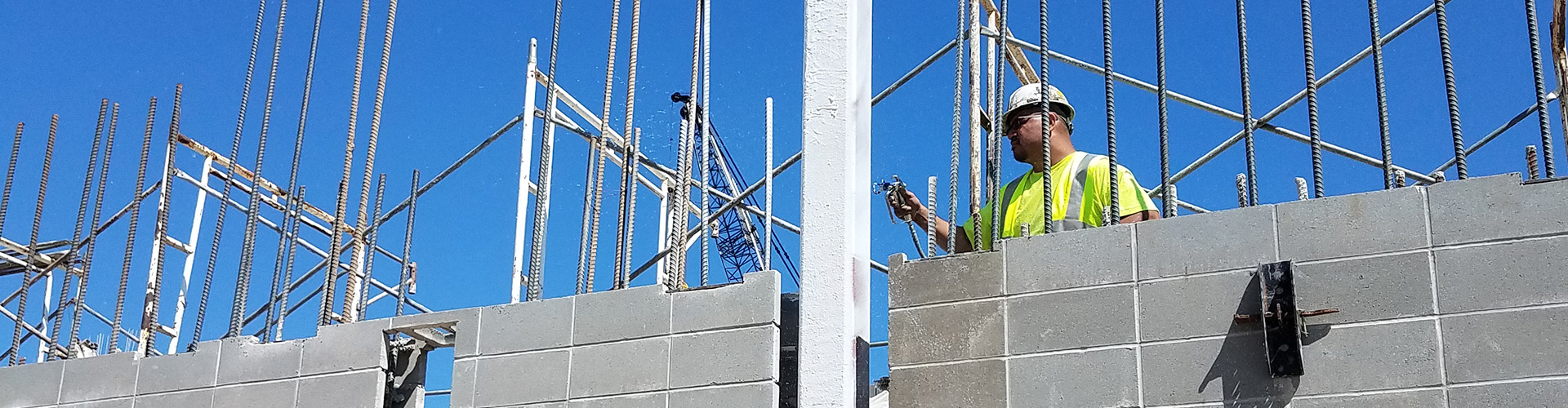 intumescent fireproofing being installed on steel structure