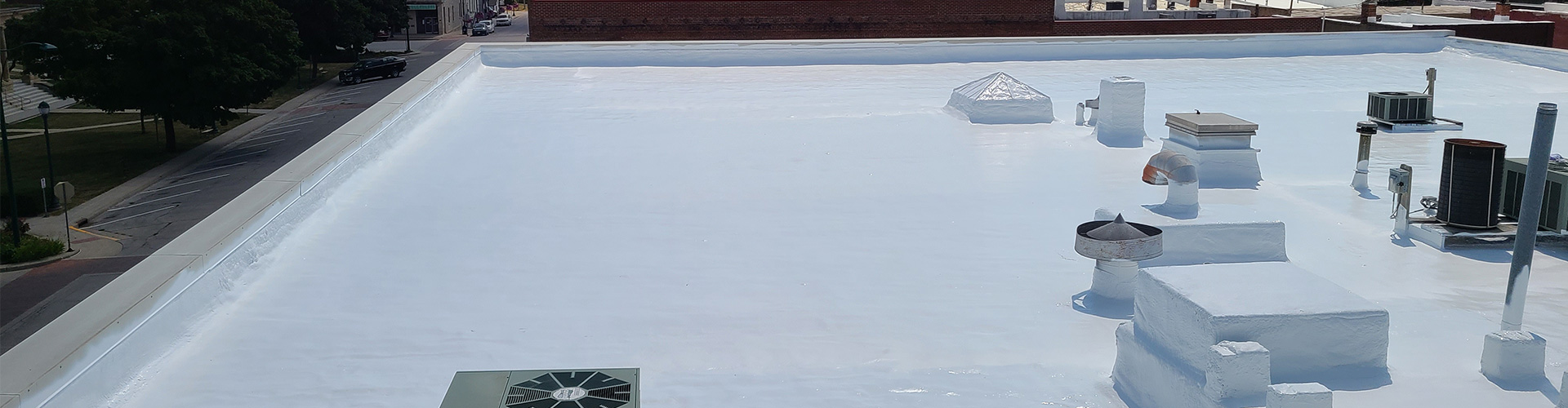 roof coating by iowa spray foam insulators