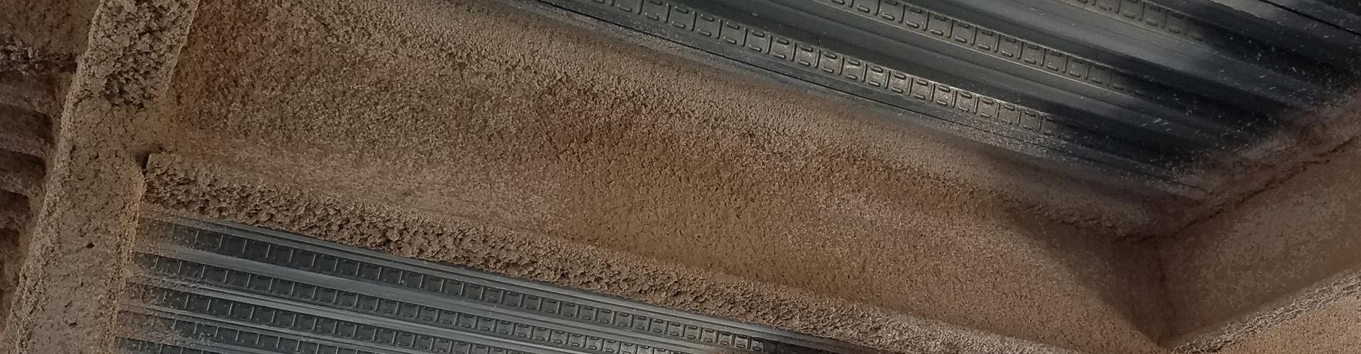 spray applied fireproofing (SFRM) applied on steel ceiling